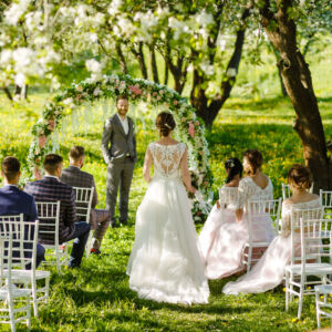 Wedding,Ceremony,In,The,Apple,Orchard,In,Spring